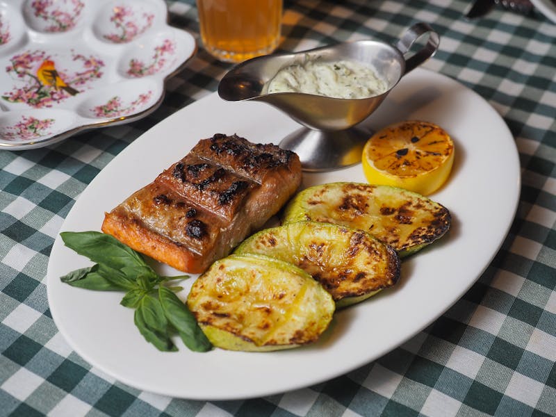 Grilled Salmon Piccata main dish at Pizzana