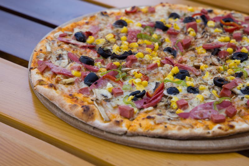 Spicy Diavola pizzana with pepperoni and chili